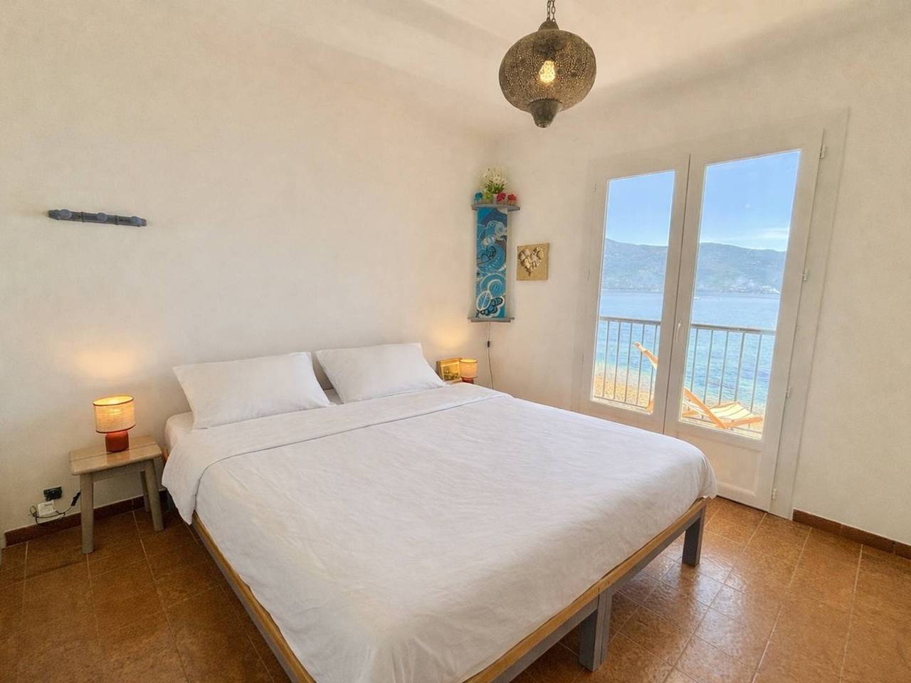 Appartement entier, Appartement pieds dans l'eau avec terrasse et superbe vue mer, Tiuccia in Casaglione, Région d'Ajaccio