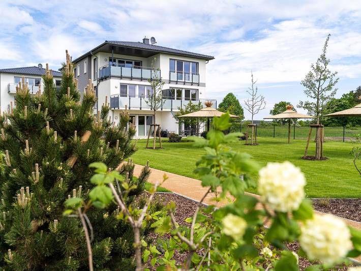 Ferienwohnung für 6 Personen, mit Balkon und Garten sowie Sauna und Seeblick in Zirchow