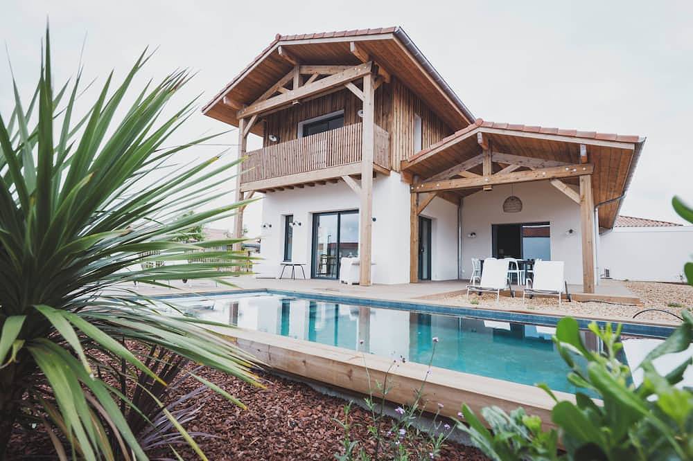 Superbe villa avec jardin, piscine chauffée, climatisation ! in Seignosse, Côte d’Argent