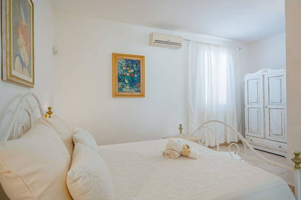 Wohnung in einem Ferienhaus mit Pool, Klimaanlage,  W-Lan, Tv, Innenhof, Haustiere erlaubt in Eden Beach, Sorso