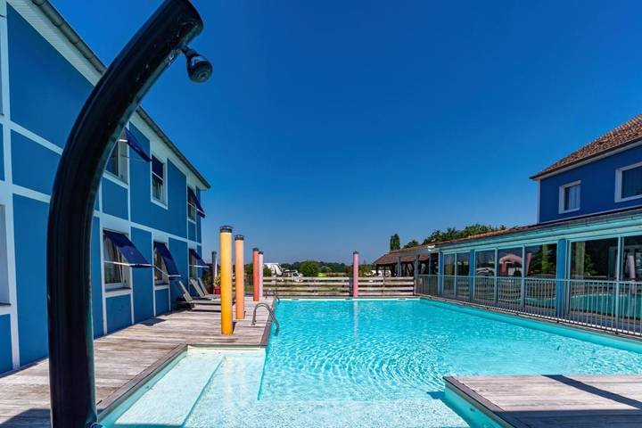 Hôtel pour 3 personnes, avec Terrasse et Jardin ainsi que Piscine et Vue