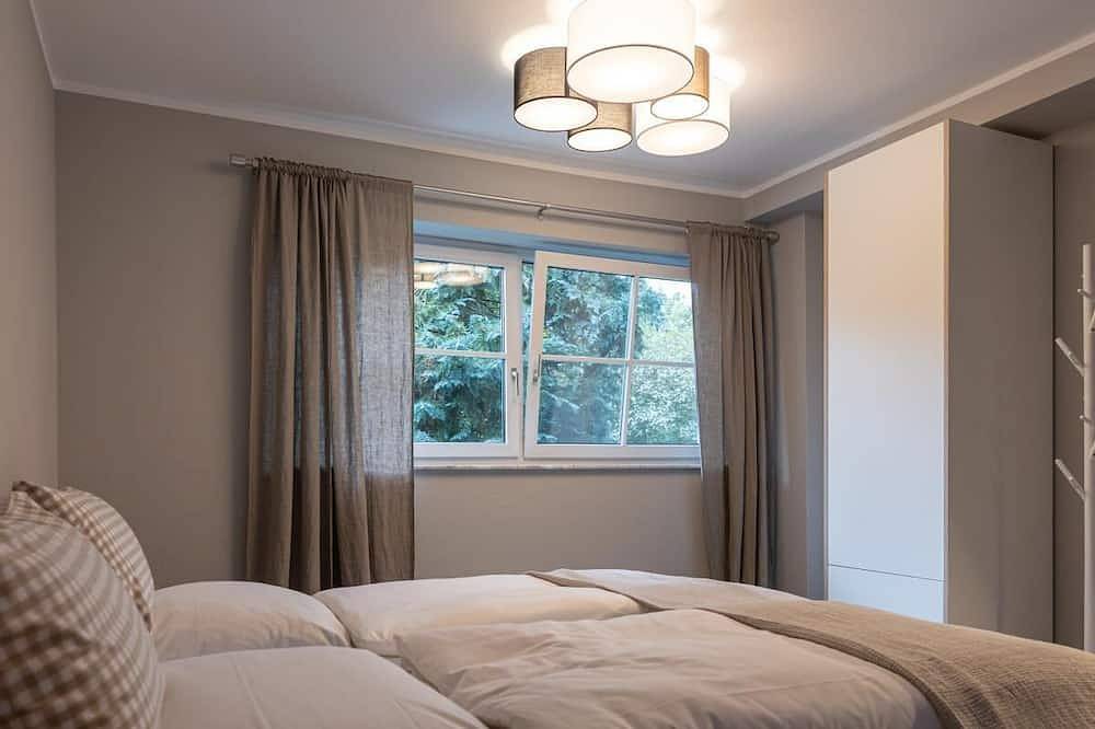 Ganze Wohnung, Schmalfelden No. 95  mit Spa-Oase im Wohnzimmer:  Kompakt-Sauna, Ruheliegen und Kamin. Eingezäunter Garten mit toller Veranda! in Schrozberg, Hohenlohe