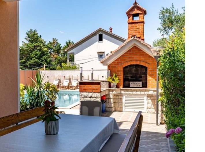 Appartement de vacances pour 4 personnes, avec Jardin et Sauna dans Rab