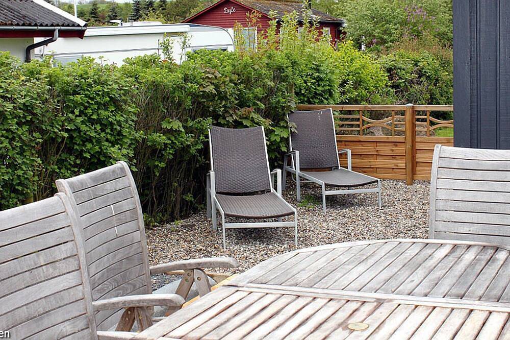 Harmoniously renovated vacation home near the beach with a view of the water in Diernæs, Haderslev
