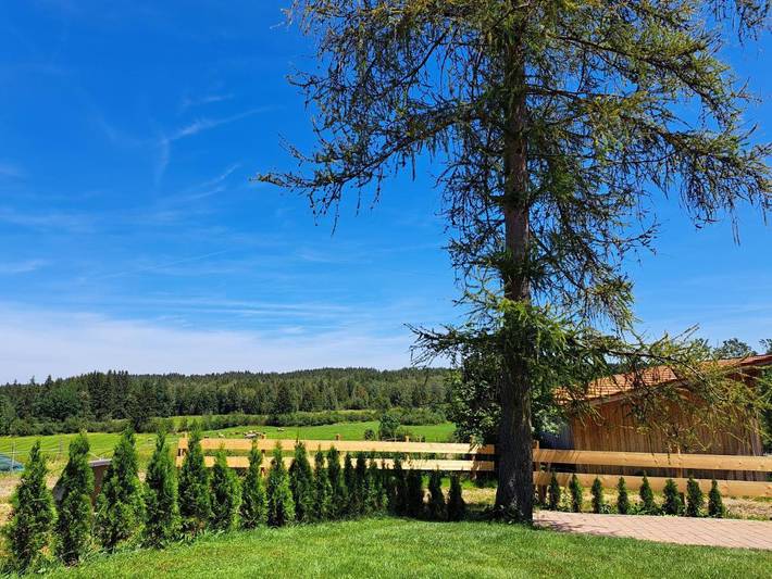 Ferienwohnung für 3 Personen, mit Terrasse und Garten sowie Ausblick
