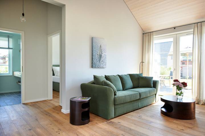 Ferienwohnung für 3 Personen, mit Sauna und Terrasse sowie Garten in Waabs