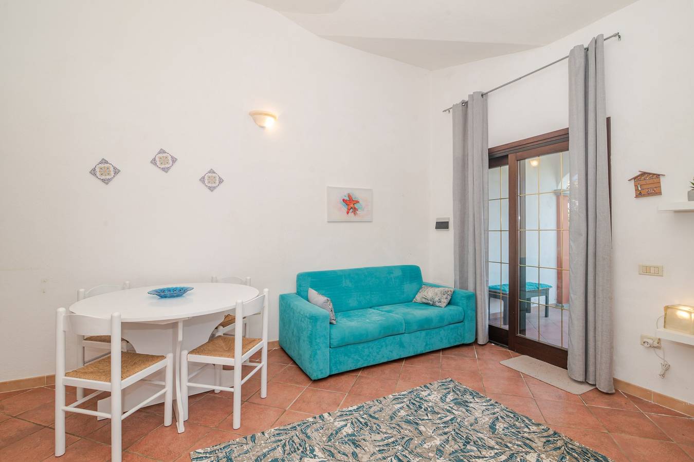 Appartamento intero, Villetta con Giardino, Piscina in Condivisione, Terrazza Privata e Aria Condizionata in Porto San Paolo, Loiri Porto San Paolo