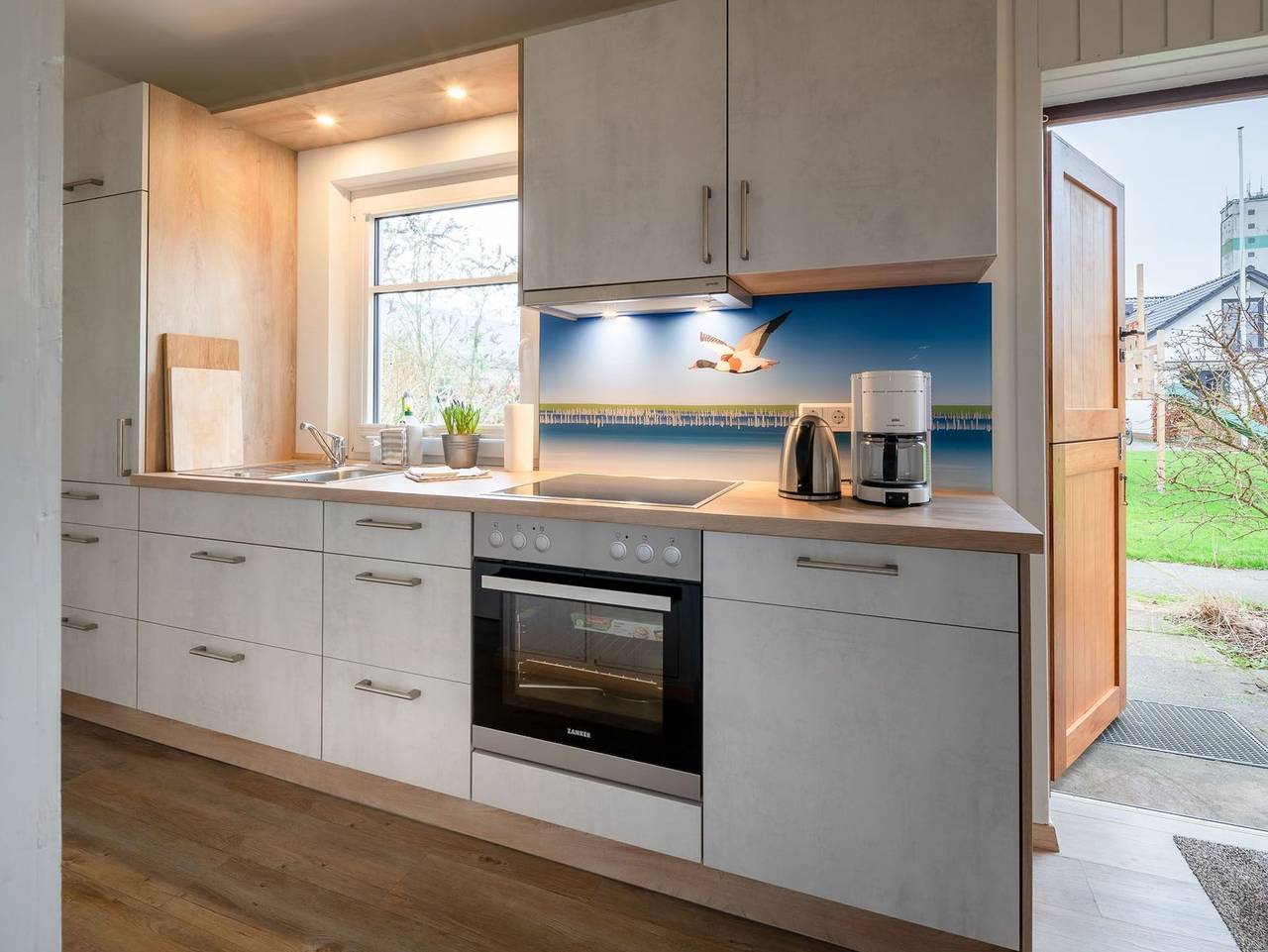 Ganze Ferienwohnung, Ferienhaus Ocke mit Sonnenterrasse - Deichhelden Nordstrand - Ferienhaus Ocke mit Sonnenterrasse - Deichhelden Nordstrand in Nordstrand (Gemeinde), Nordstrand