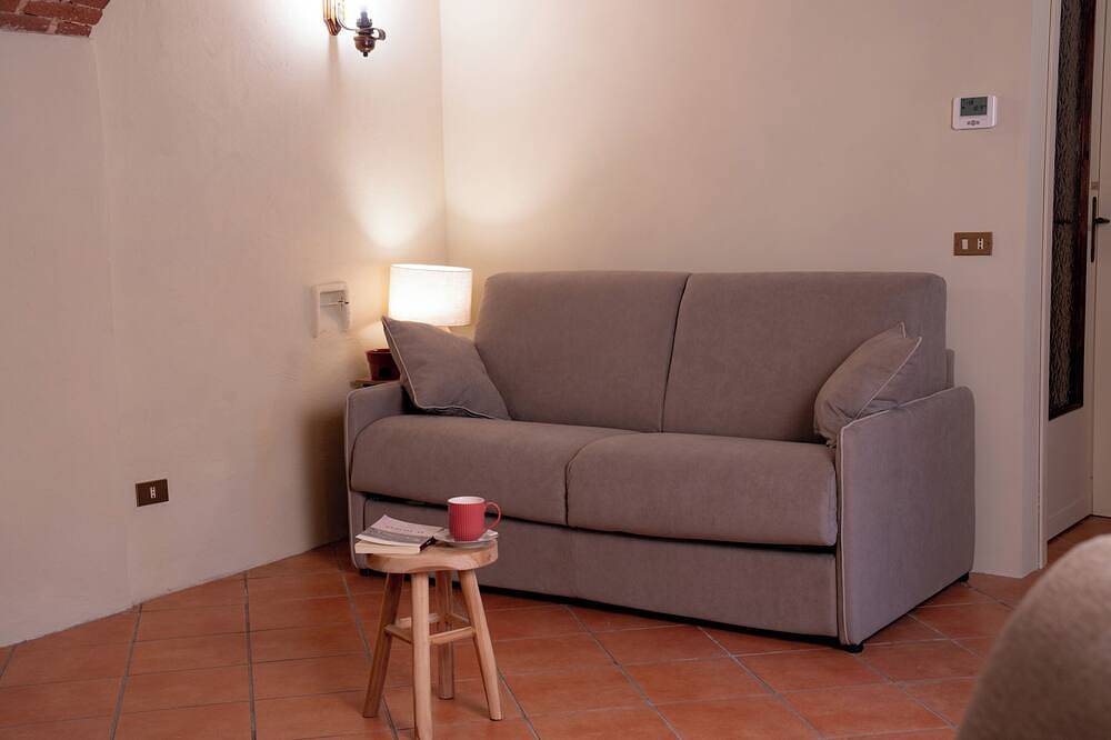 Bruno Selvago's Casba.  Rustic house with exposed brick surrounded by vineyards. in Lessona, Provincie Biella