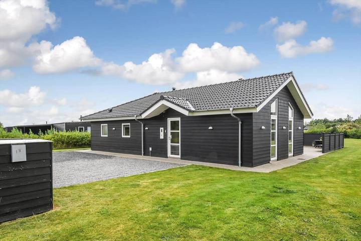 Ferienhaus für 8 Personen, mit Whirlpool und Terrasse sowie Sauna in Stauning