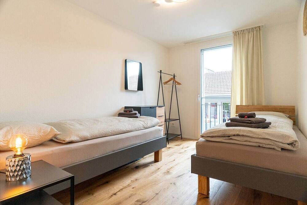 Ganze Wohnung, Apartment Stockhorn near the lake and mountains in Spiez, Thunersee