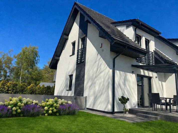Ferienhaus für 8 Personen, mit Garten