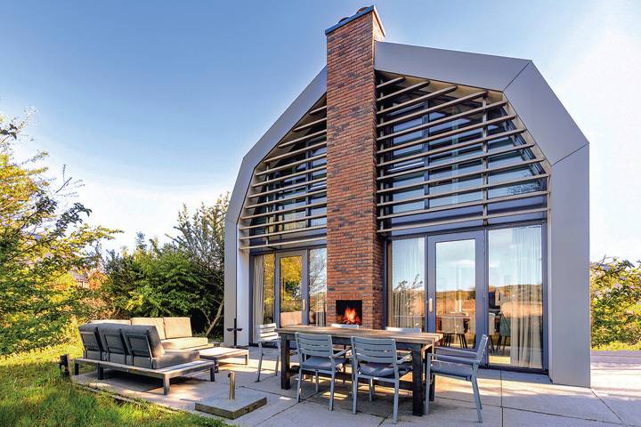 Ferienhaus für 6 Personen, mit Balkon/Terrasse und Terrasse sowie Garten und Sauna