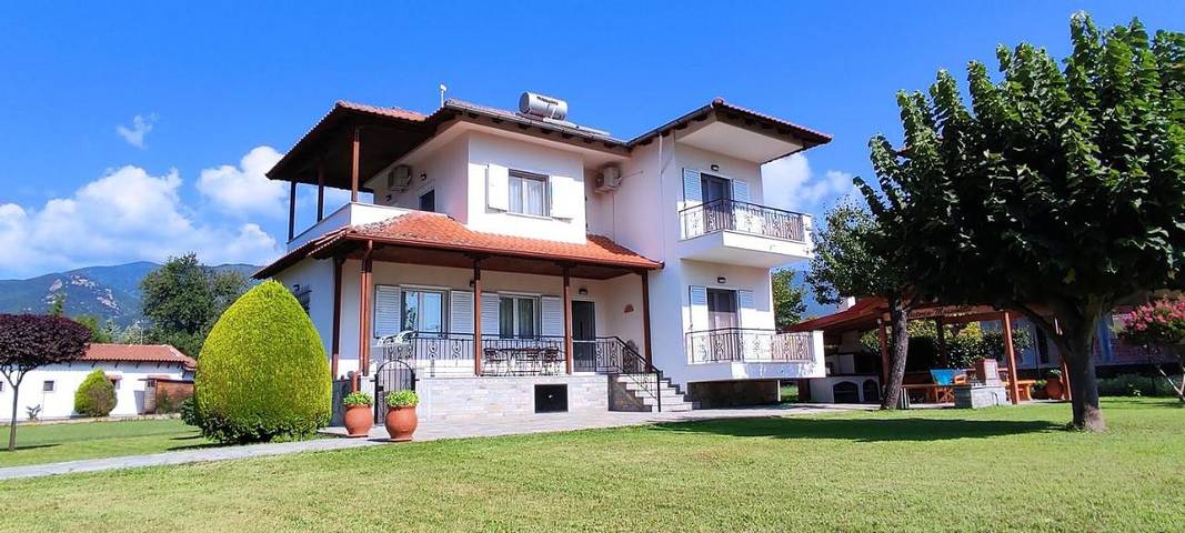 Ferienhaus für 7 Personen, mit Balkon und Terrasse sowie Garten und Ausblick