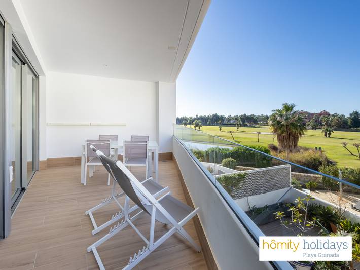 Apartamento para 6 personas, con terraza además de jardín y vistas, Familias con niños en Playa Granada