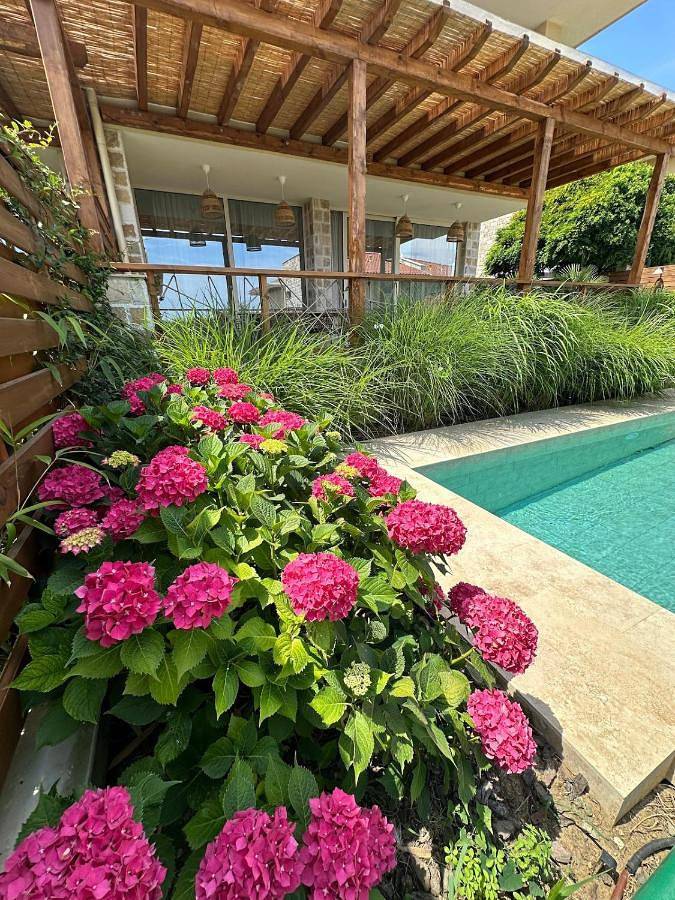 Ferienhaus für 7 Personen, mit Balkon und Terrasse sowie Garten und Pool