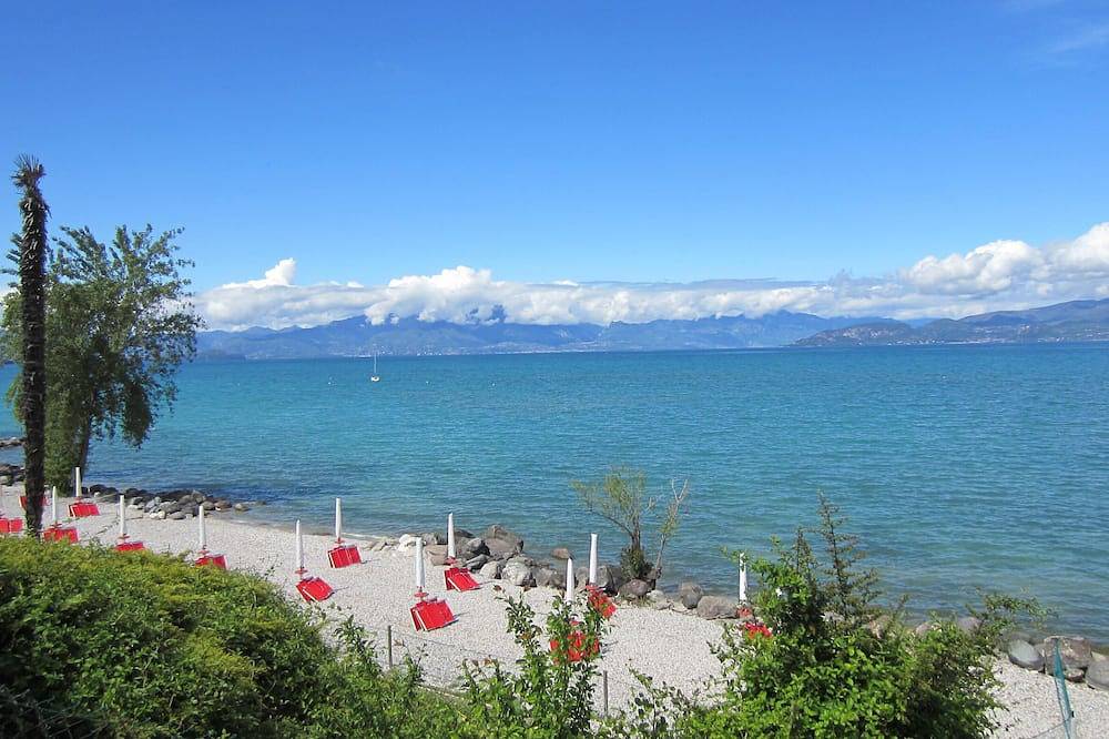 Geheel appartement, Renovated Lakefront Apartment: New Management Casa Amelias in San Benedetto (Peschiera del Garda), Peschiera del Garda