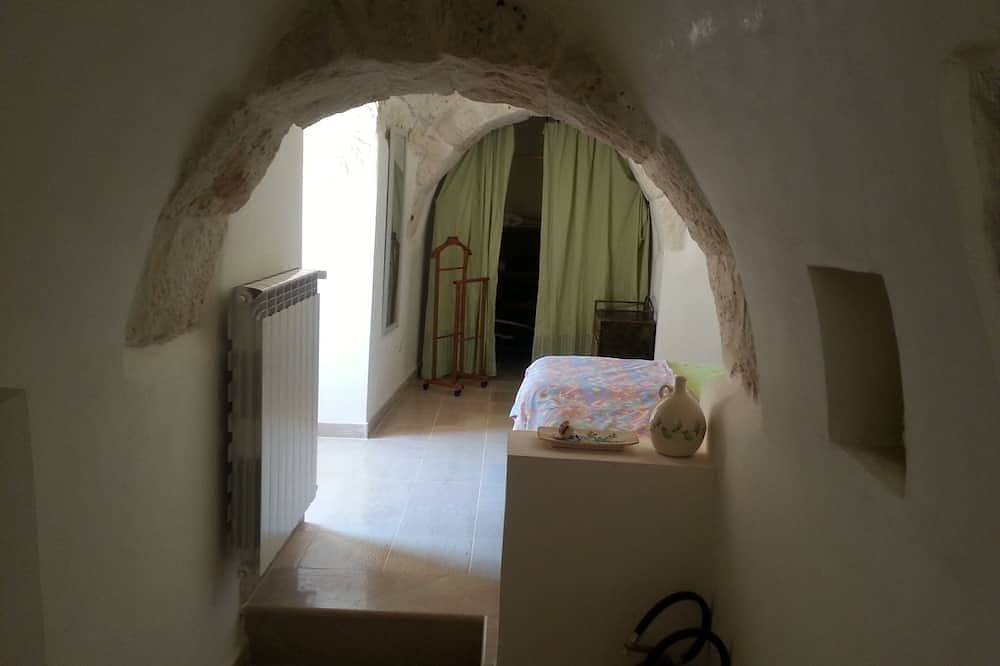 Trullo in an evergreen olive grove in Salento, Apulia. in Ceglie Messapica, Salento