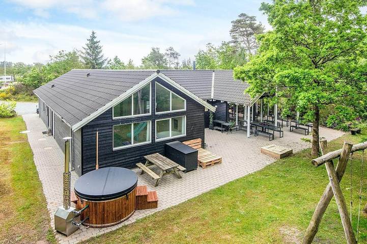 Ferienhaus für 18 Personen, mit Whirlpool und Terrasse sowie Pool und Sauna in Filsø See