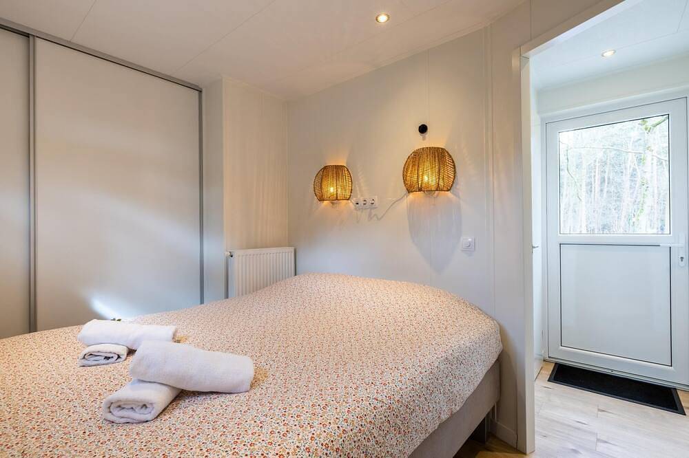 Luxuriöse Waldunterkunft mit Terrasse und Grill in Veluwe