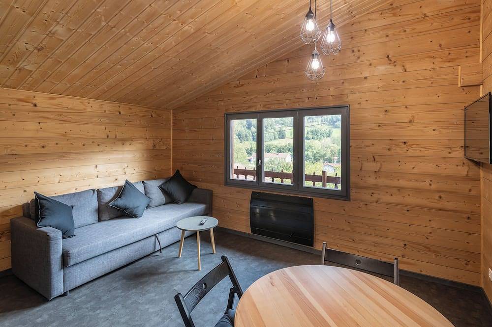 Charmant chalet du Faubourg, spa privatif, 4p in Rochesson, Parc naturel régional des Ballons des Vosges