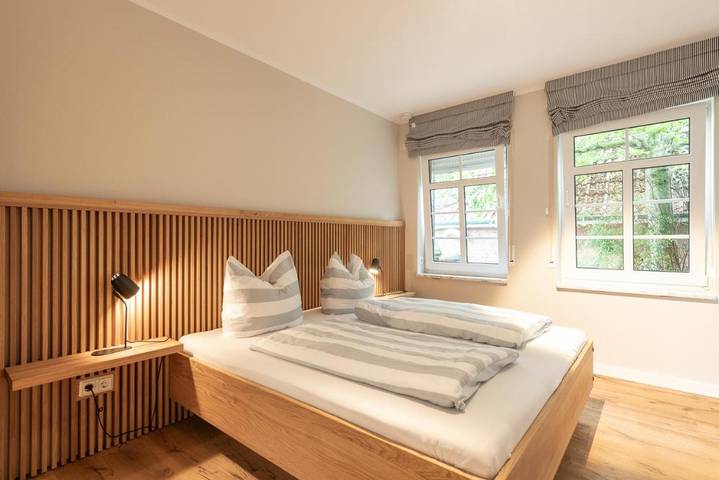 Ferienhaus mit Meerblick für 8 Personen, mit Terrasse und Garten sowie Ausblick in Neßmersiel
