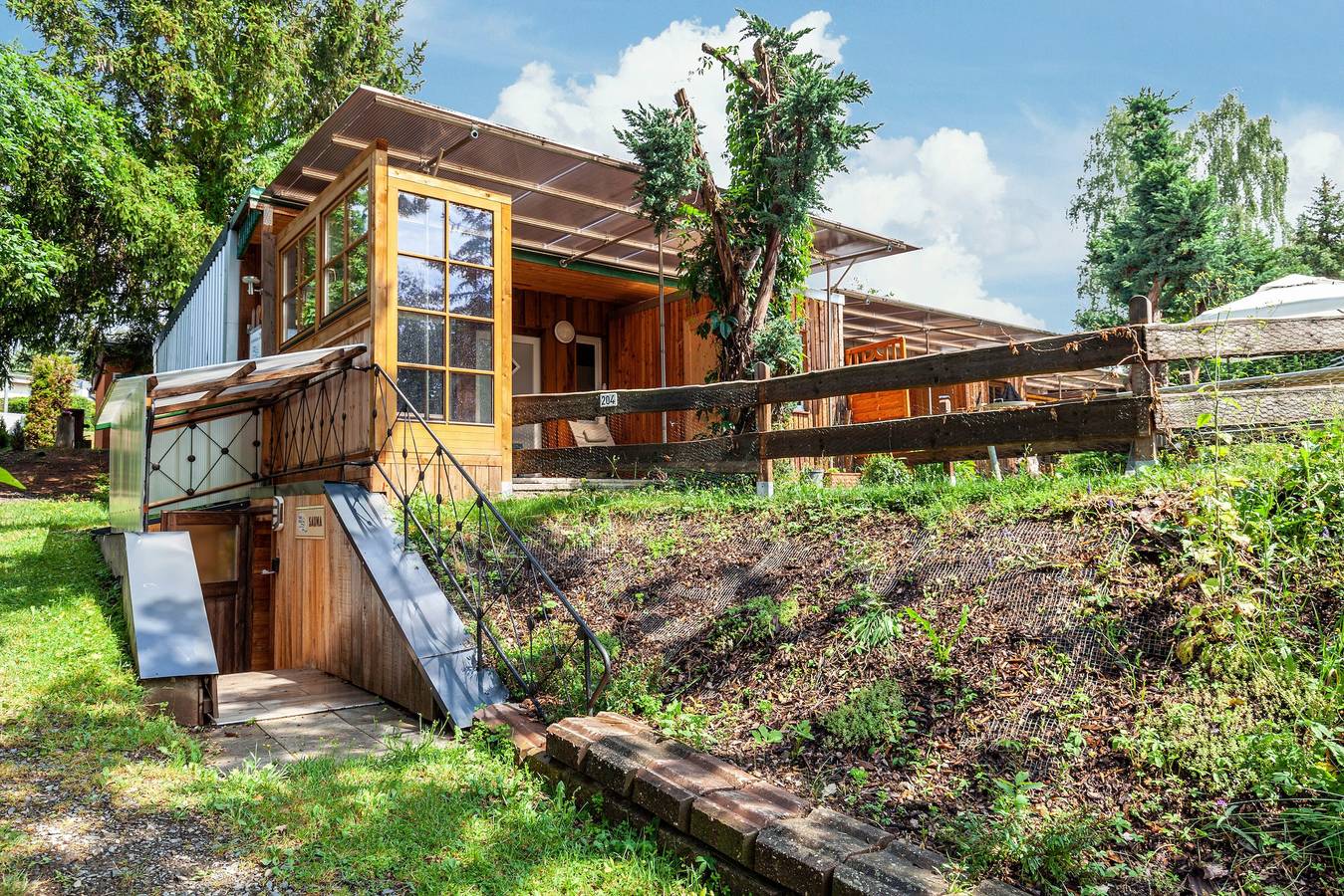 Ferienhaus 204 mit privater Terrasse, Garten und Wlan in Bungalowdorf Zadelsdorf, Zeulenroda-Triebes