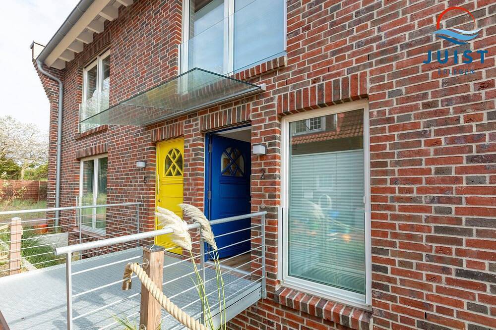 Familien- und hundefreundliche moderne Ferienwohnung mit Südterrasse am Watt — Bild 2