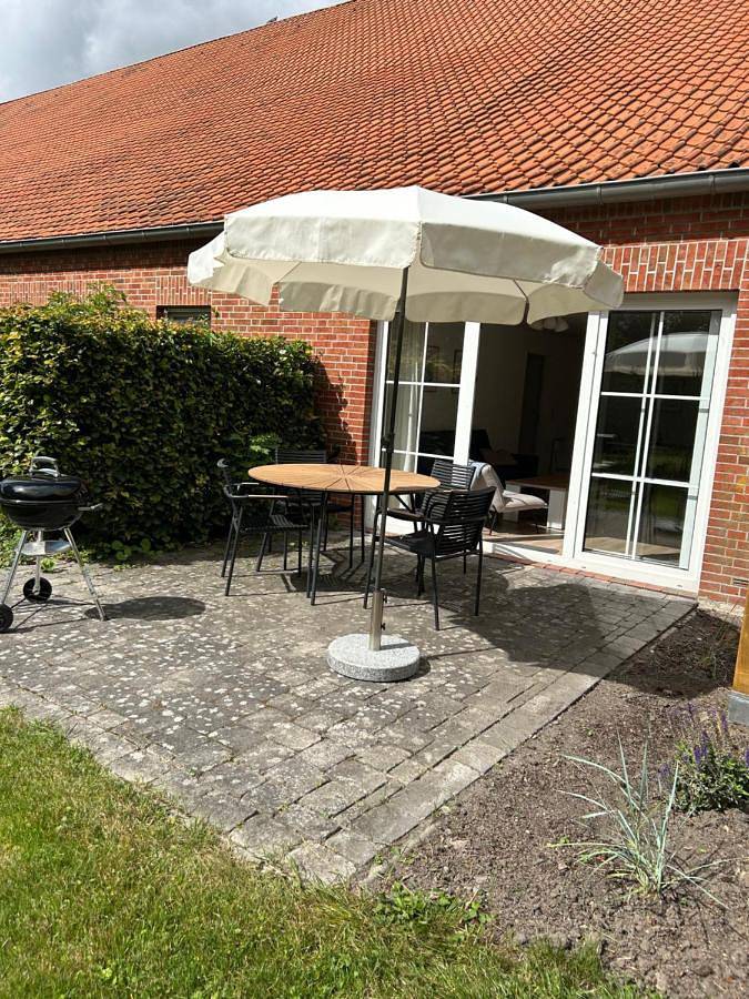 Ferienwohnung für 4 Personen, mit Terrasse und Garten sowie Ausblick in Pewsum - 2
