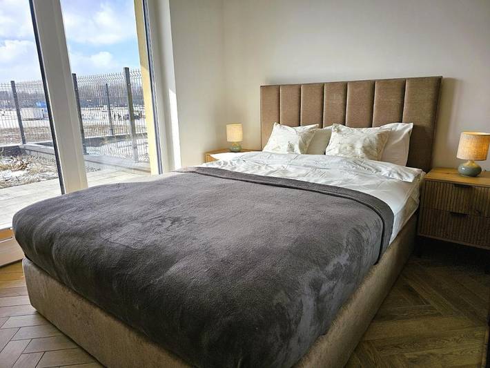 Apartament wakacyjny dla 4 osób, z widok na jezioro i widok oraz ogród w Radom