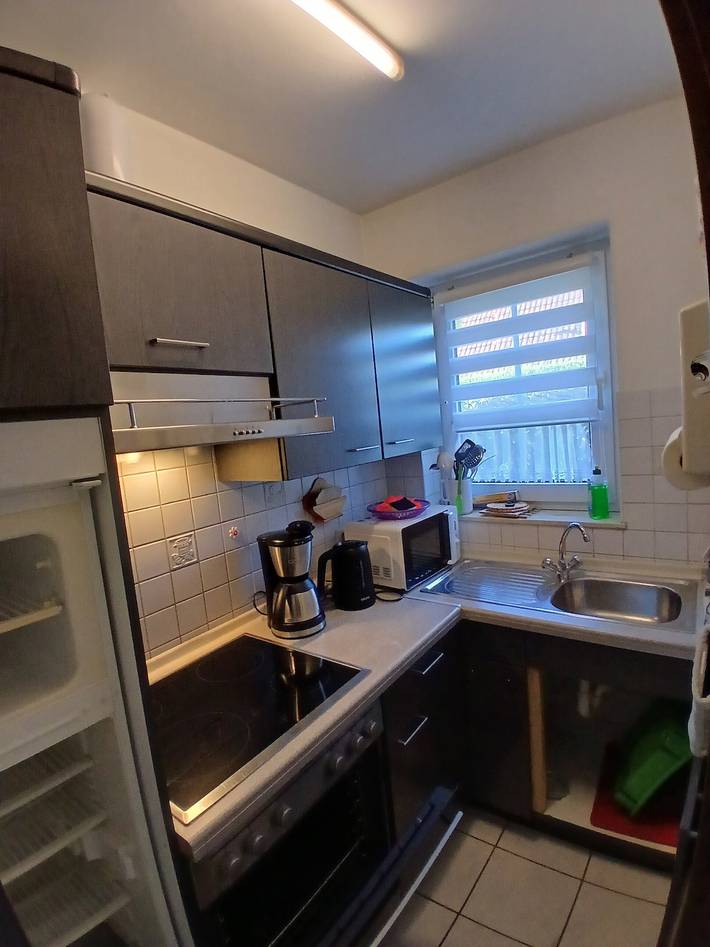 Holiday Home 'Ferienhaushälfte Hahn' with Private Terrace, Shared Garden and Wi-Fi in Otterndorf, Cuxland