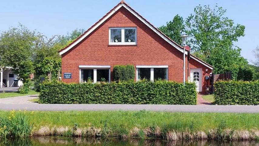 Gîte pour 2 personnes, avec jardin à Rhauderfehn