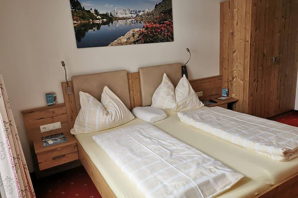 Design Doppelzimmer mit Bergblick - No1 - Flo´s Rooms & Breakfast in Wagrain, Ski Amadé