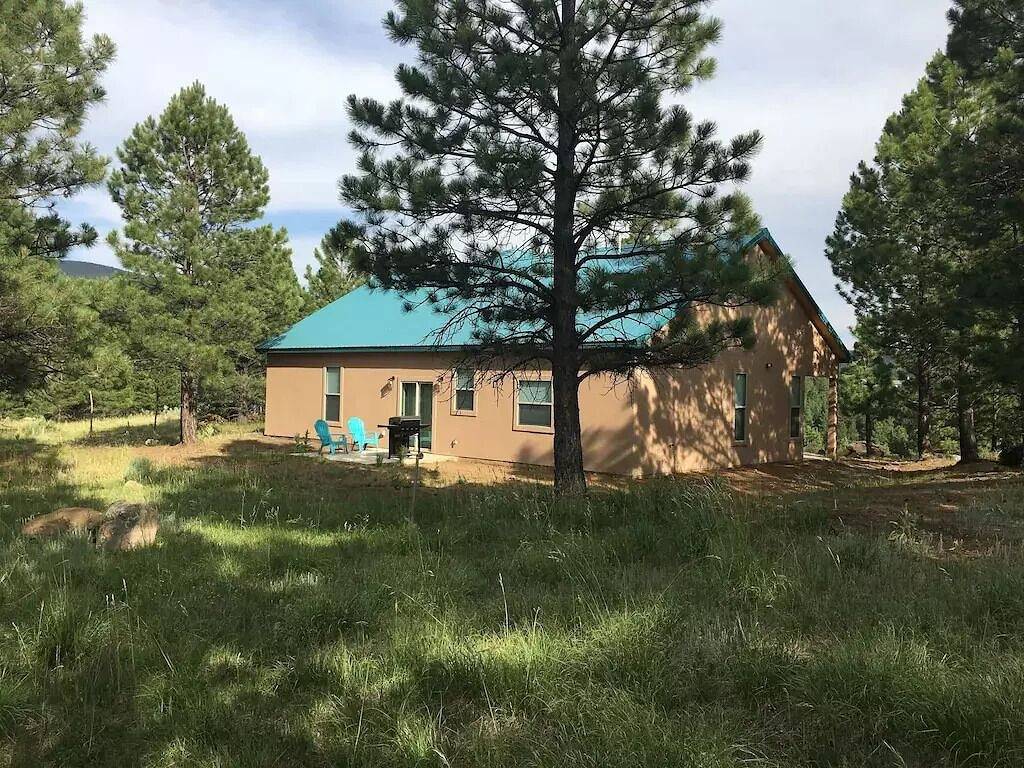 Custom Home with Two Private Master Suites and Heated Garage in Angel Fire, Colfax County
