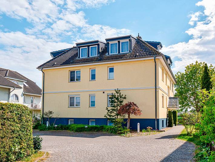 Ferienwohnung für 4 Personen, mit Balkon und Garten sowie Sauna