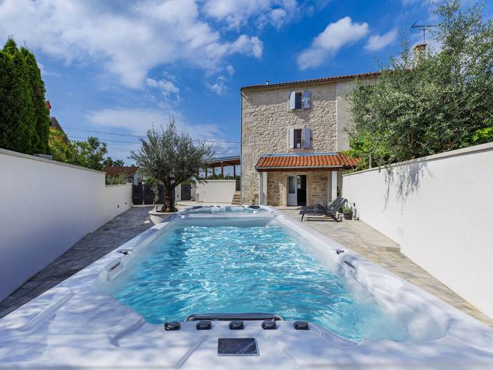 Ferienhaus für 4 Personen, mit Terrasse und Garten