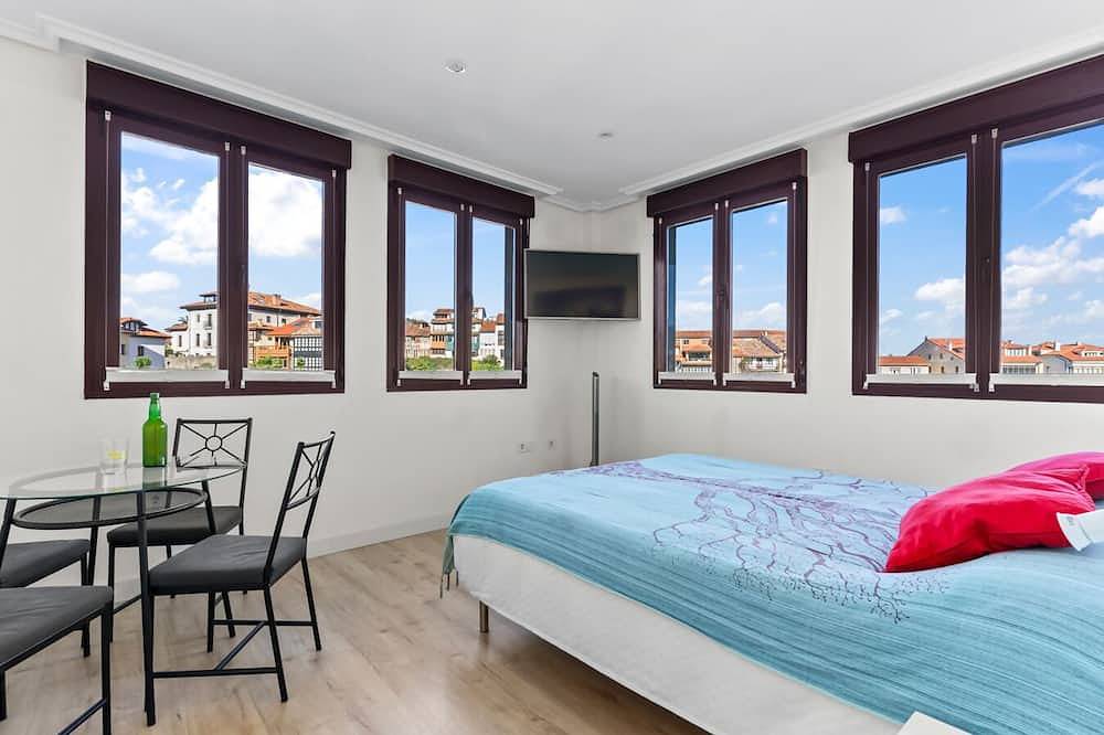 Apt. San Antón in front of the port of Llanes in Llanes, Costa Verde (Spain)