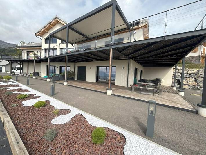 Appartement de vacances pour 5 personnes, avec jardin ainsi que vue et vue sur le lac