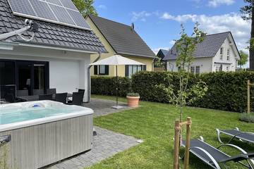 Ferienhaus für 8 Personen, mit Whirlpool und Garten sowie Sauna, mit Haustier in Göhren-Lebbin