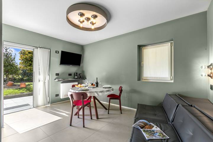 Appartamento intero, Villa Al Fiume - Oasi Verde in Torbole sul Garda in Nago-Torbole, Prealpi Gardesane