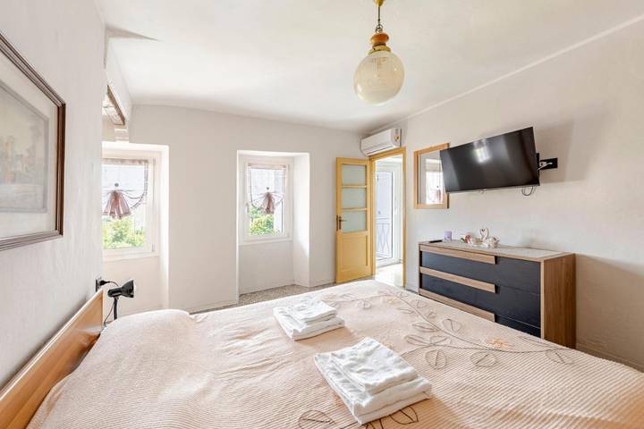 Maison de vacances pour 4 personnes, avec vue sur le lac ainsi que vue et balcon