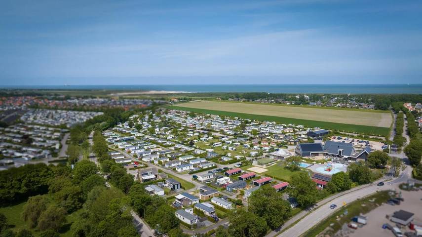Vakantiepark voor 4 personen, with Terras and Tuin as well as Kinderzwembad and Zwembad in Zeeuws-Vlaanderen