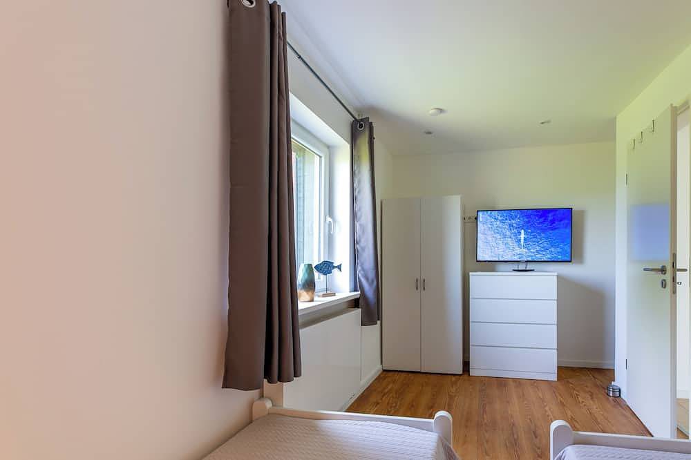 Ferienhaus Ckate Gemütliches Ferienhaus mit Kamin, Sauna & großem Garten in Brokdorf, Kreis Steinburg