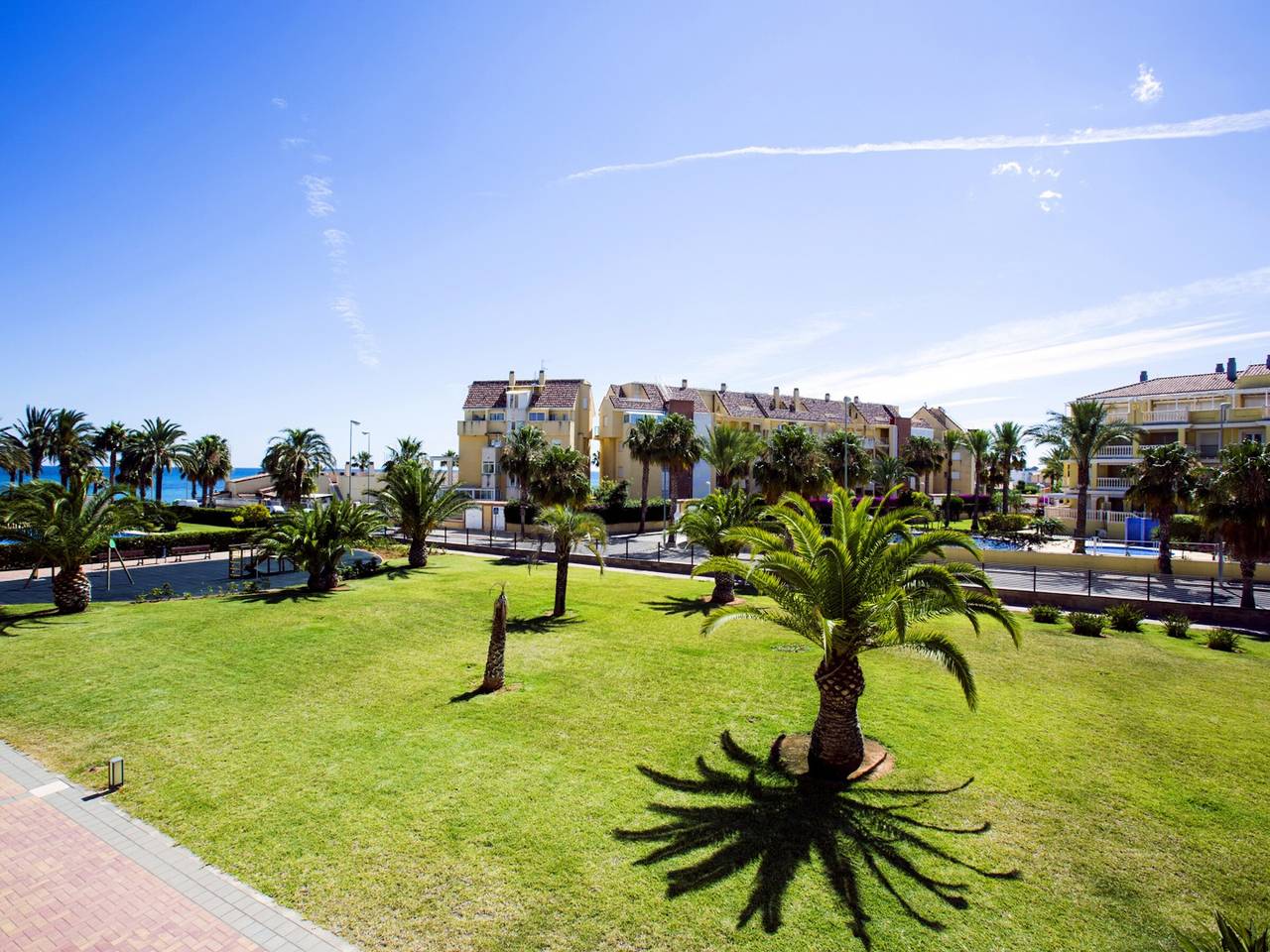 Entire apartment, Beachfront Apartment in Denia with Pool and Parking in Almadrava, Costa Blanca