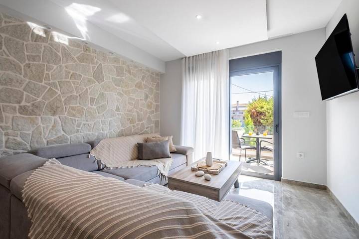 Ferienwohnung für 4 Personen, mit Balkon und Ausblick in Asini