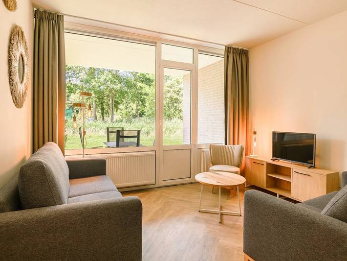 Vakantieappartement voor 4 personen, with Balkon and Whirlpool as well as Tuin and Zwembad in Bruinisse