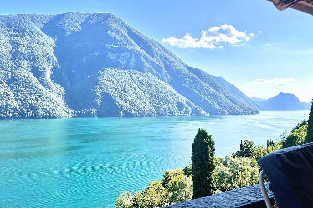 Ganze Wohnung, Exklusives Penthouse mit herrlichem Seeblick, großer Terrasse, Garten & Pool in Cressogno, Valsolda
