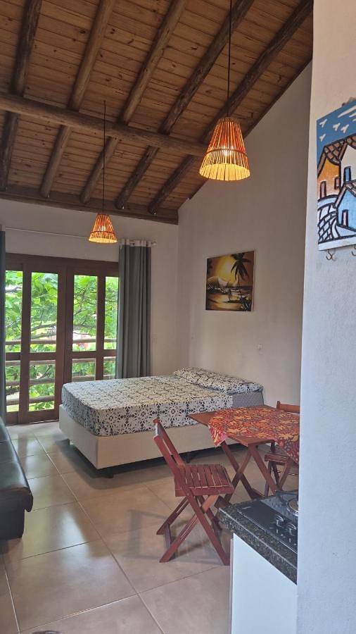 Casas e apartamentos de temporada para 4 pessoas, com balcão e jardim e ainda vista em Palhoça