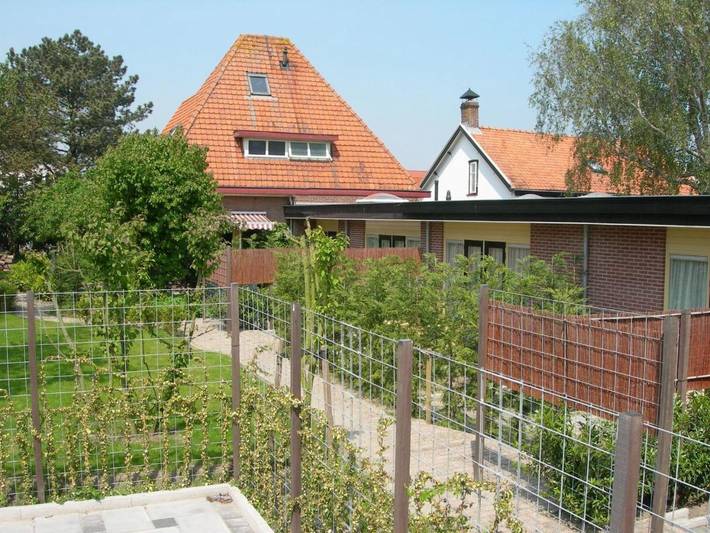Ferienwohnung für 3 Personen, mit Terrasse und Garten sowie Ausblick in Kamperland
