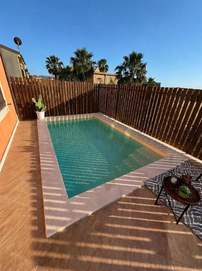 Ferienwohnung für 2 Personen, mit Balkon und Pool sowie Ausblick in Palma di Montechiaro
